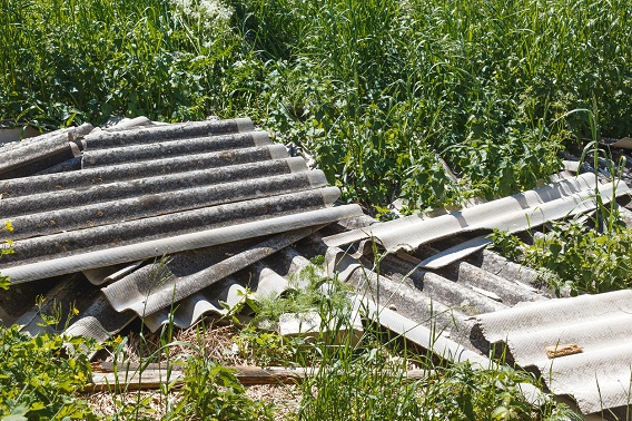 Damaged asbestos roofing material