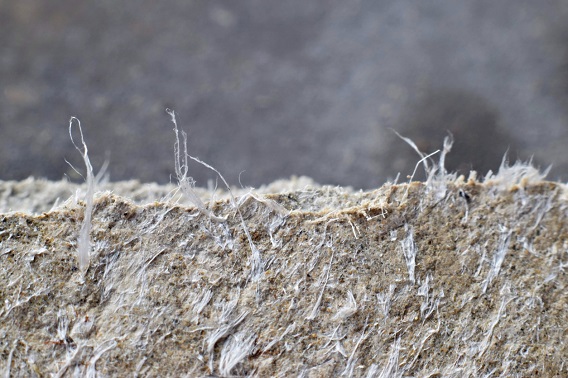 Detailed photography of roof covering material with asbestos fibers