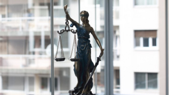 Justice figurine with scale