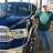 Mesothelioma Survivor Nick P. next to his blue truck