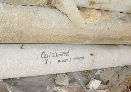Pipes with covering labeled Certain-teed