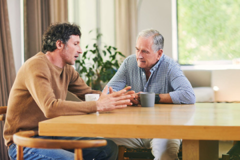 A father discusses his mesothelioma diagnosis with his adult son.