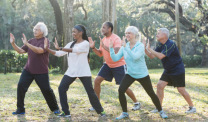 Mesothelioma patients practicing tai chi in a park