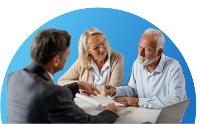 Mature couple speaking with a male lawyer.