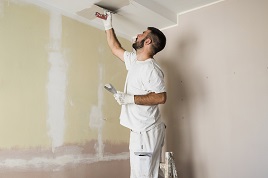 Painter painting ceiling