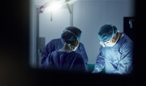 Doctors in a hospital performing surgery.